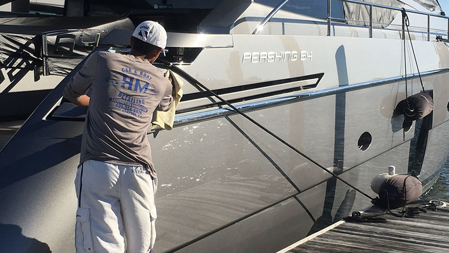 man washing boat
